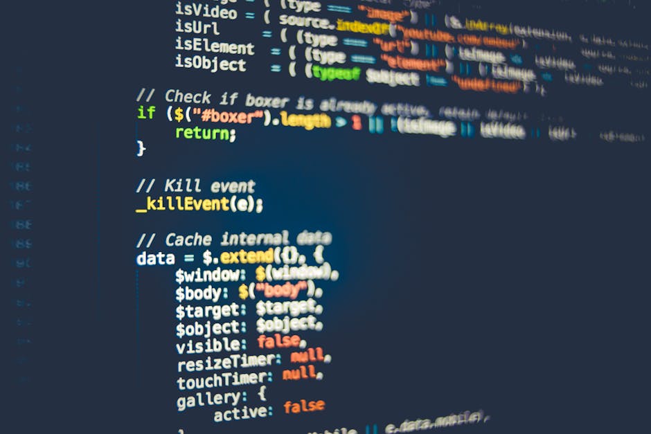 A close-up view of a computer screen displaying colorful lines of code in a text editor, with a focus on the various syntax highlighting styles including pink, green, blue, and white. The background i